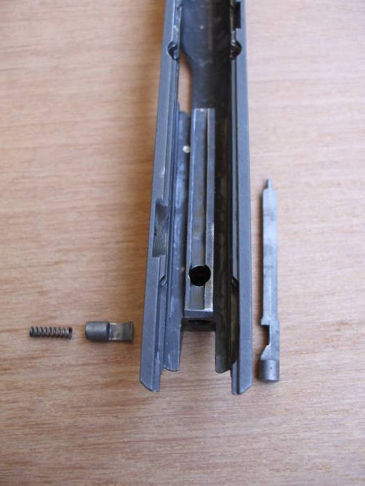 Original firing pin and retaining plunger.