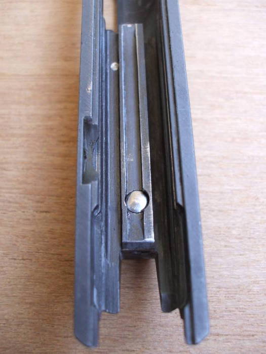 Firing pin detent inserted into slide.