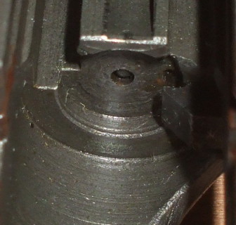 Correctly assembled firing pin and slide.  The tip of the firing pin is well below the surface of the bolt face.